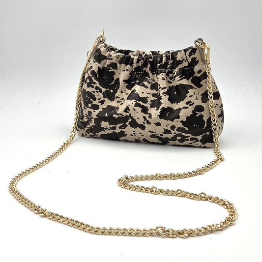 Animal print leather ruched opening clutch bag with chain crossbody